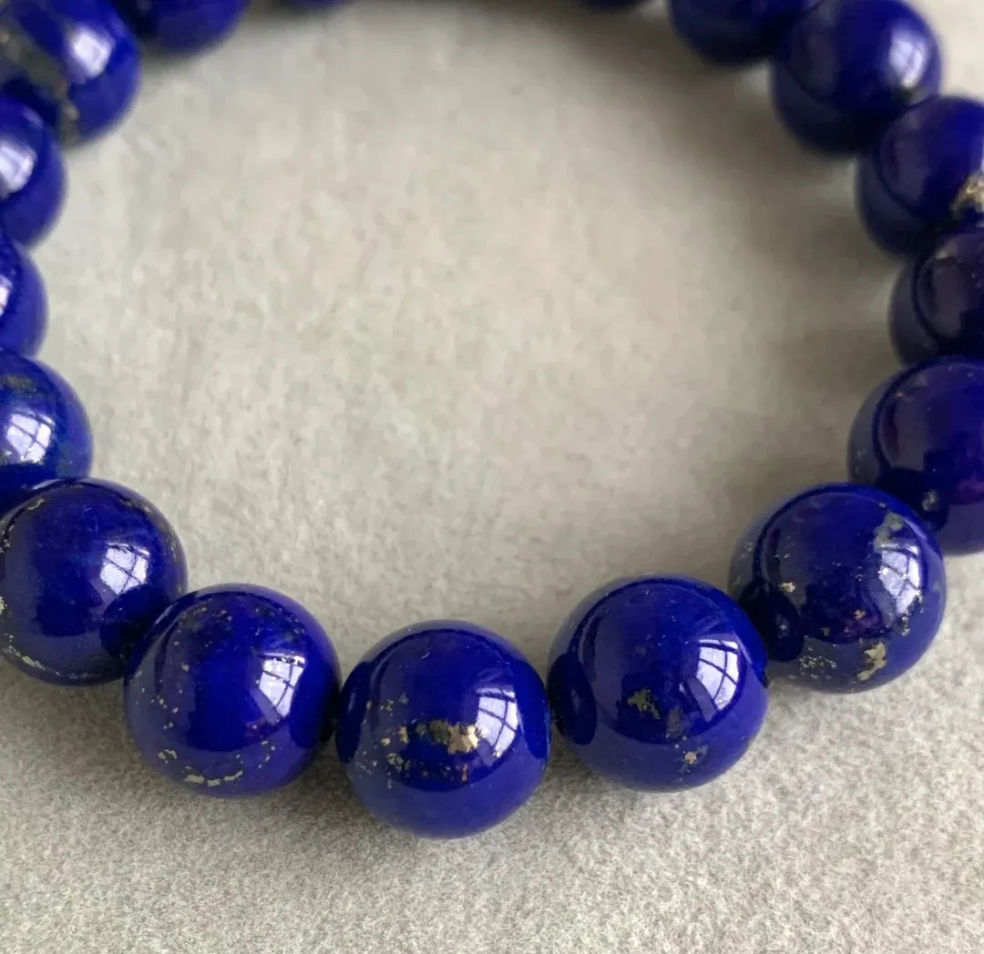 Close-up of deep blue lapis lazuli with natural gold-colored metallic flecks