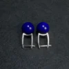 Back view of deep-blue lapis bead earrings with hinged silver clasps