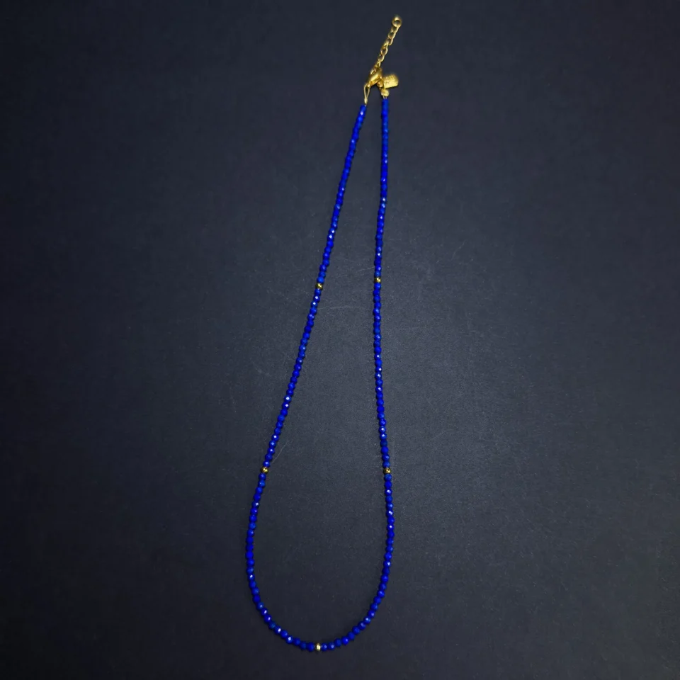 Vertical view of the fine blue lapis lazuli necklace and extender clasp