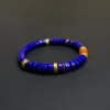 Angled lapis heishi bracelet with gold-plated silver spacer details