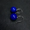 Angled imperial-blue lapis bead earrings with polished silver fish hooks