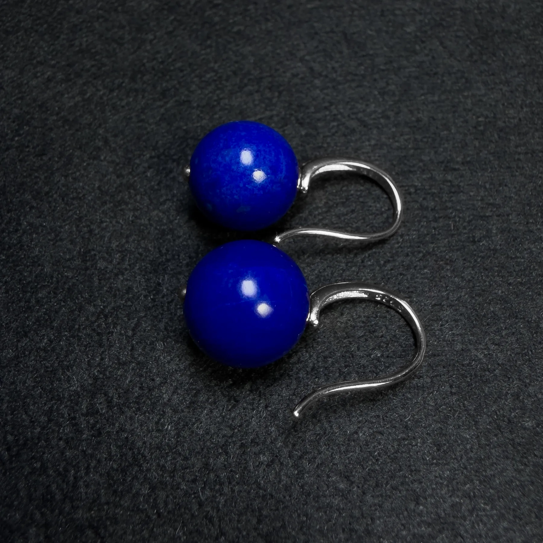 Angled imperial-blue lapis bead earrings with polished silver fish hooks