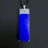 Royal-blue lapis lazuli pendant with scattered golden pyrite flecks