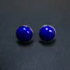 Front view of round Imperial lapis lazuli stud earrings in silver bezel settings