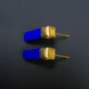 Rear profile of lapis earrings showing gold posts and square stud backs