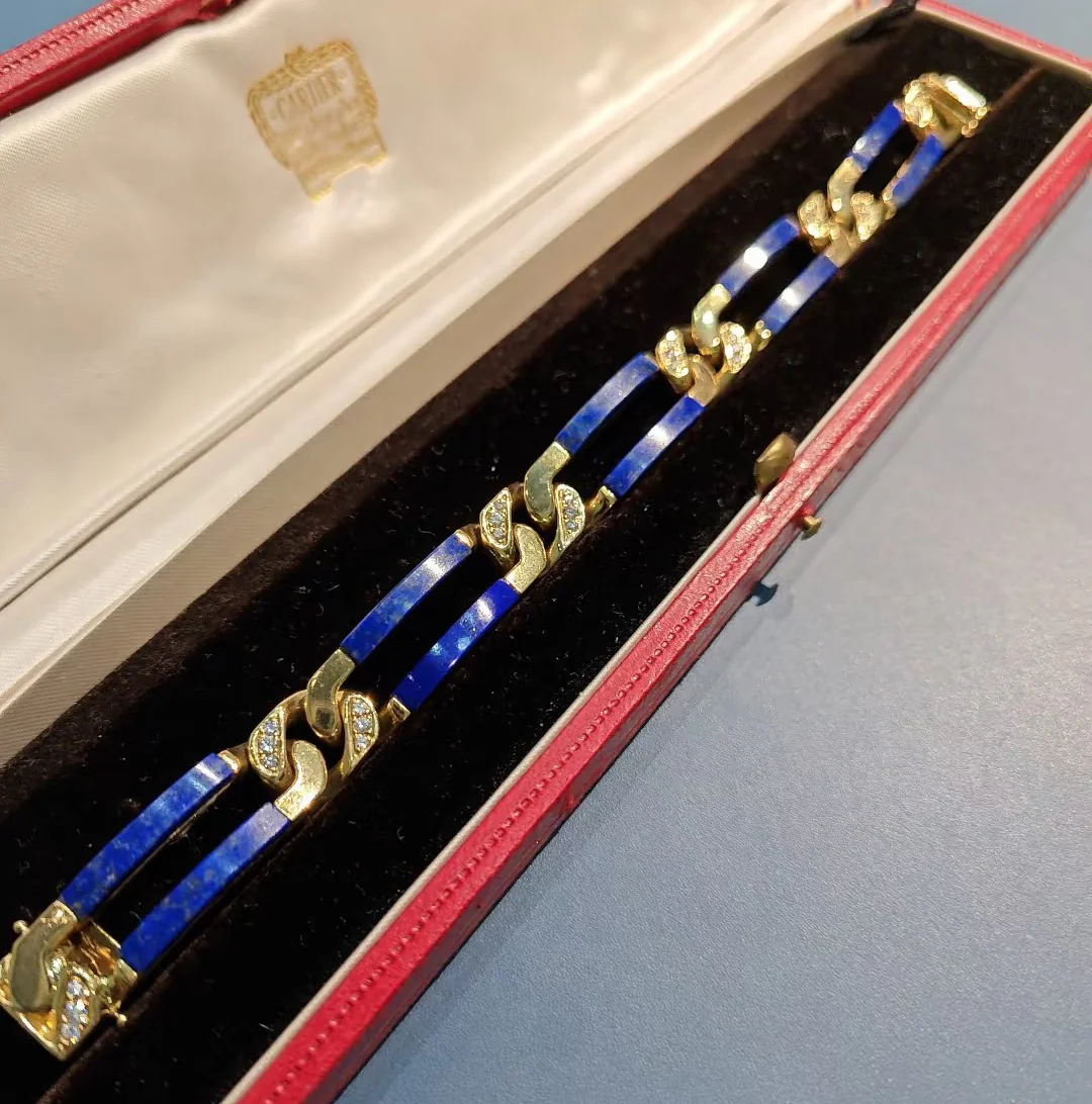 Deep blue lapis lazuli bracelet presented in a red jewelry box