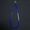 Vertical view of blue lapis lazuli column bead necklace with extender chain