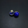 Rear and front view of lapis stud earrings with silver framework and post back