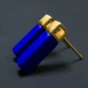 Close-up of matte gold square settings on cobalt blue lapis earrings