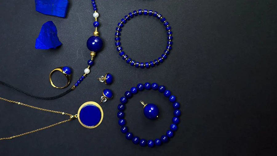Lapis lazuli necklaces earrings pendant and bracelets arranged together