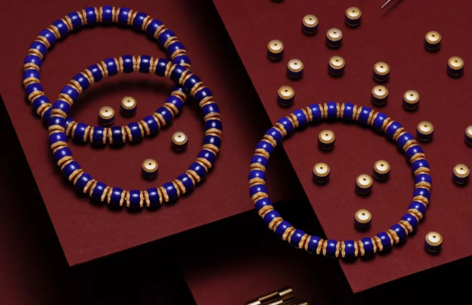 Lapis lazuli bracelets with deep blue beads and gold-tone accents