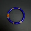 Lapis lazuli and Nanhong agate bracelet with blue disc beads