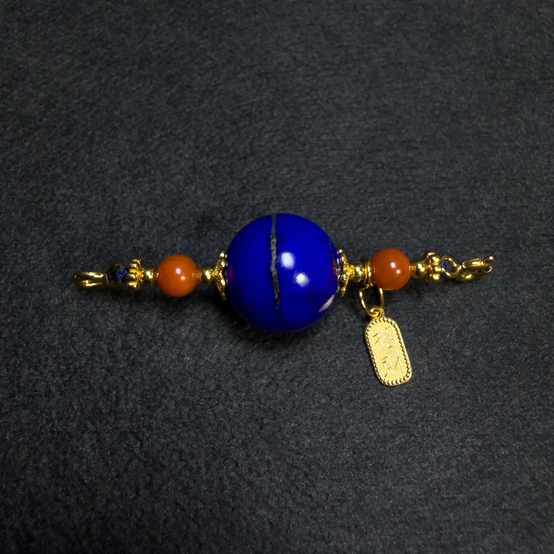 Pendant-only assembly with blue lapis bead, red agate, and Na Fu charm