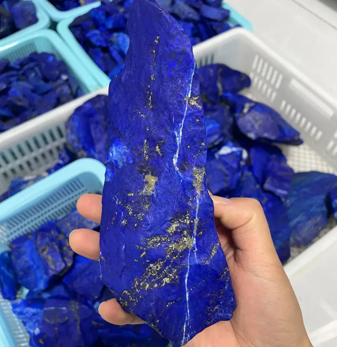 Rough lapis lazuli specimen with natural gold-colored pyrite traces
