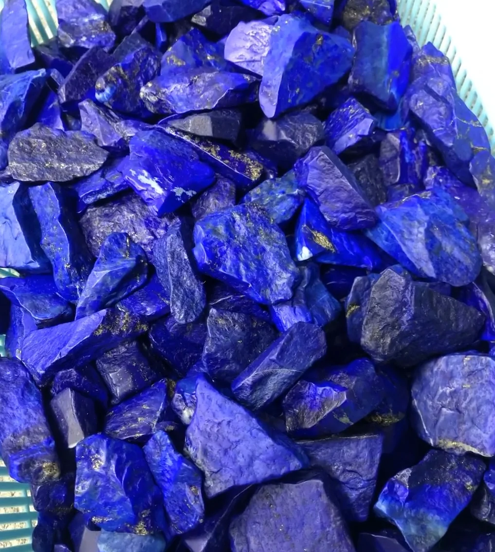 Rough lapis lazuli stones with visible gold-colored pyrite flecks