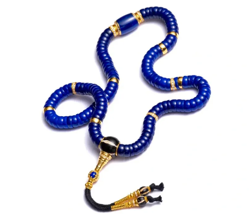 Long blue lapis lazuli bead necklace with gold-tone clasp details
