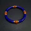 Front detail of Nanhong agate beads with lapis and cubic zirconia spacers