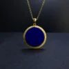 Close front detail of polished natural lapis lazuli in a round setting