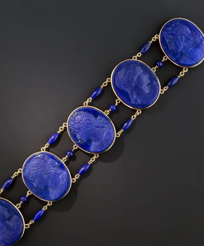 Ornate lapis lazuli bracelet with carved blue stone sections