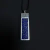 Back view of rectangular lapis lazuli pendant in silver frame