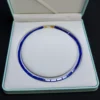 Rectangular lapis lazuli bead necklace displayed inside an open jewelry box