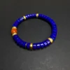 Southern red agate focal bead on a blue lapis lazuli bracelet