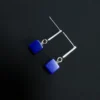Rear view of lapis cube earrings showing silver posts and vertical bars