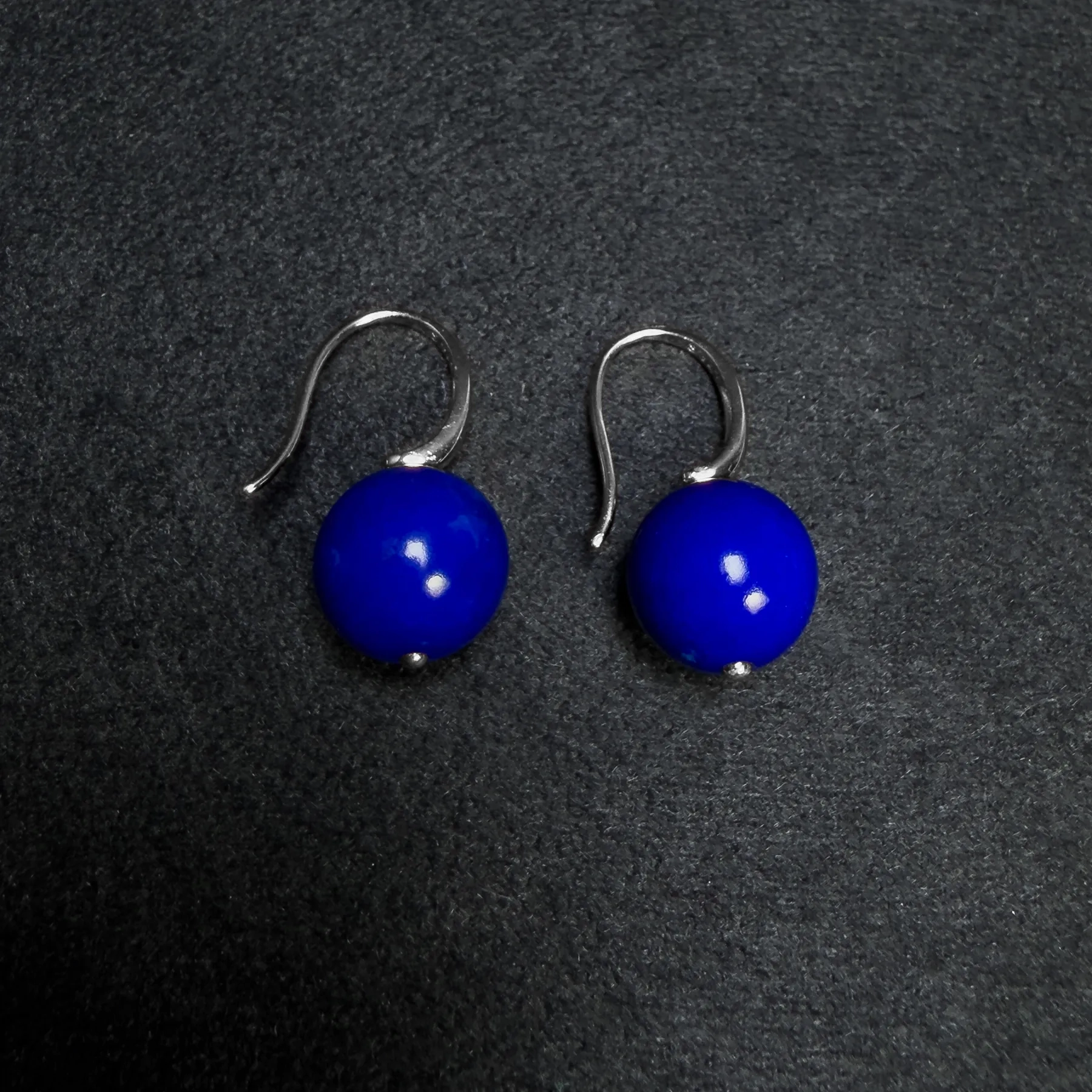 Sterling silver lapis lazuli bead earrings with deep-blue round stones