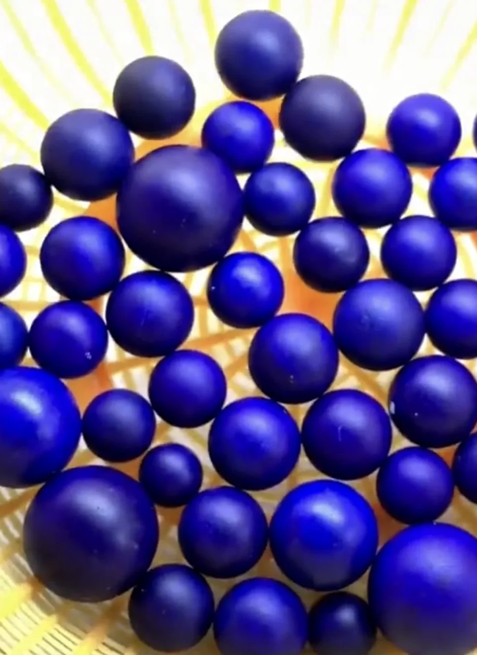 Matte lapis lazuli round beads before final polishing