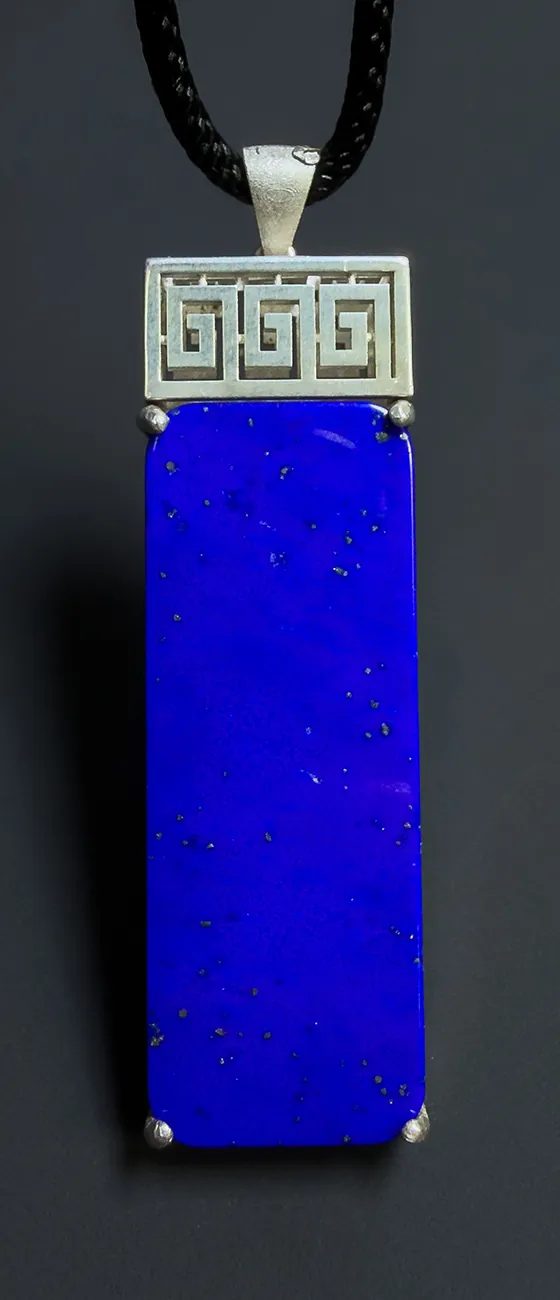Rectangular lapis lazuli pendant with geometric metal setting