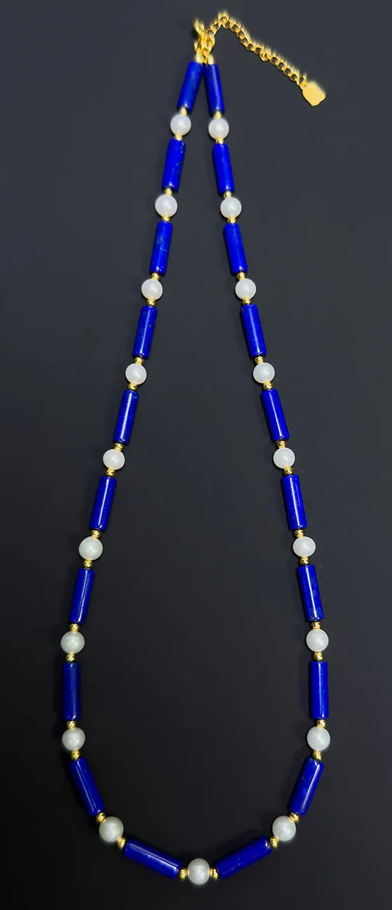 Lapis lazuli tube bead necklace with white beads and gold-tone accents