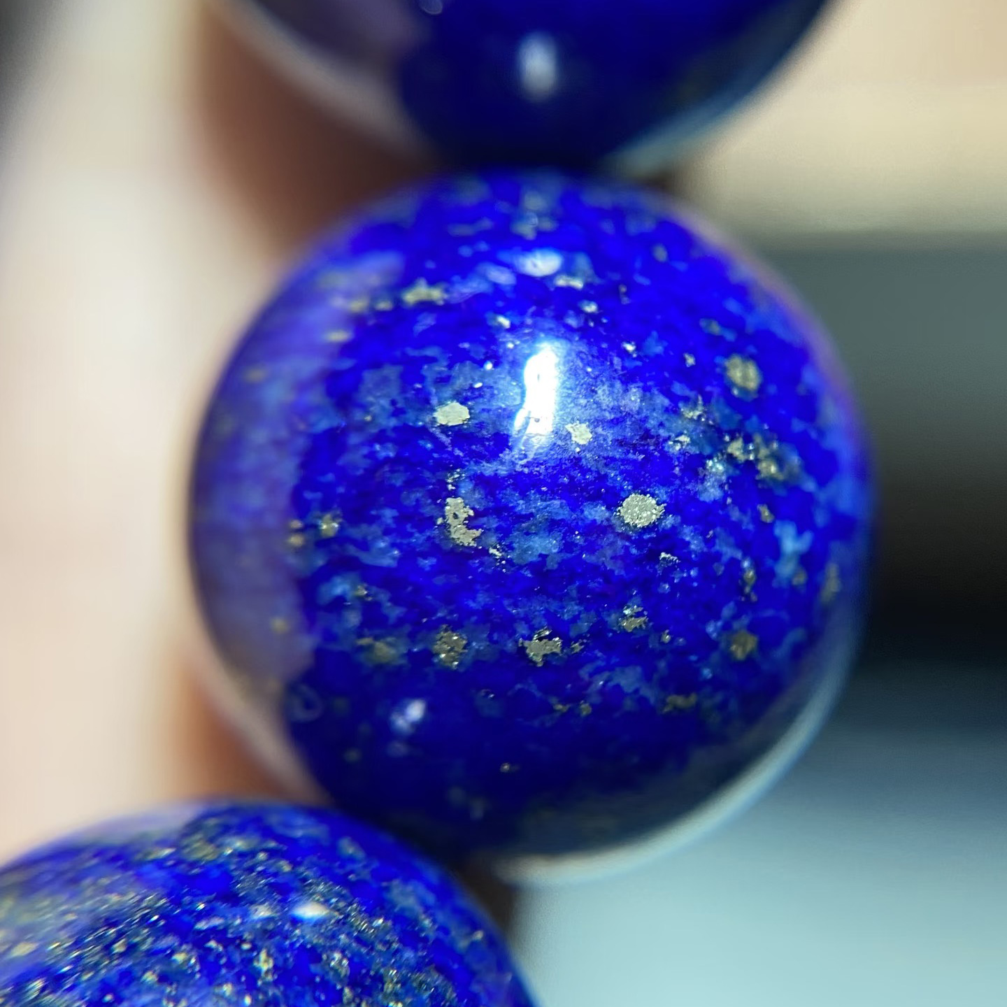 Macro close-up of lapis lazuli with fine pyrite and pale mineral areas
