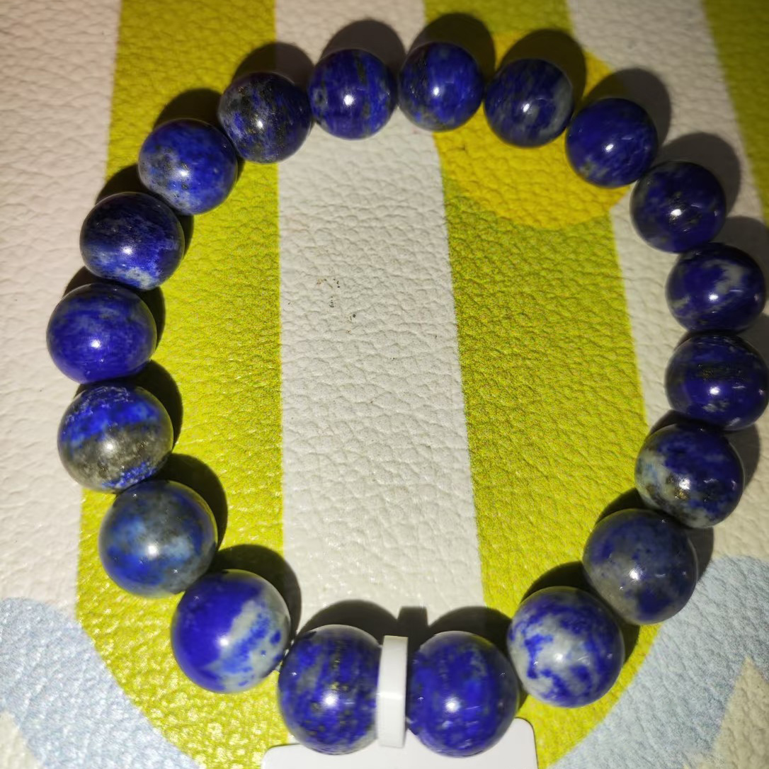 Lapis lazuli beads with large white calcite patches and pyrite