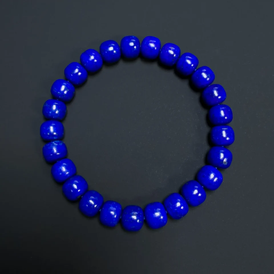 Overhead view of the blue rounded barrel bead bracelet