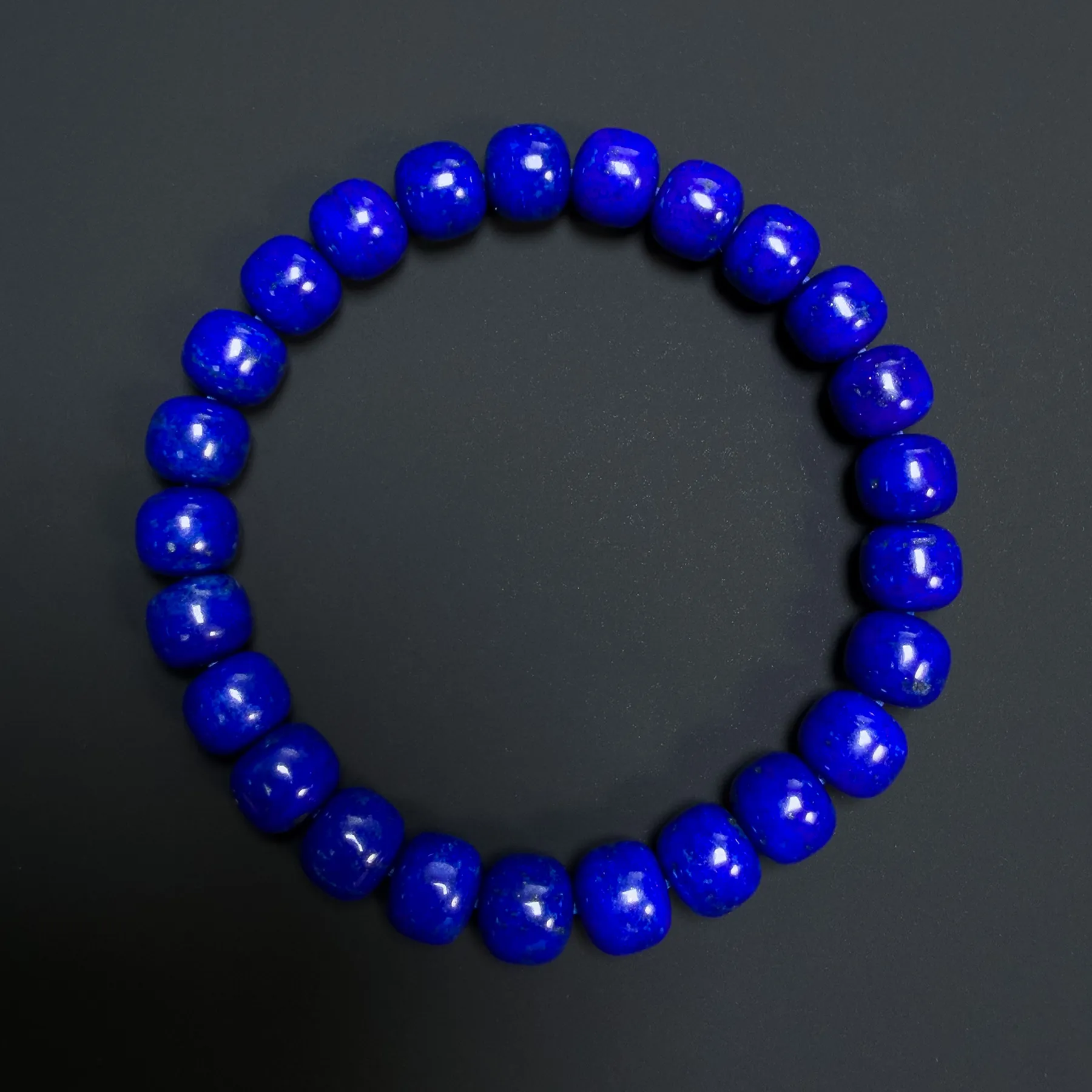Natural lapis lazuli barrel bead bracelet arranged in a circle