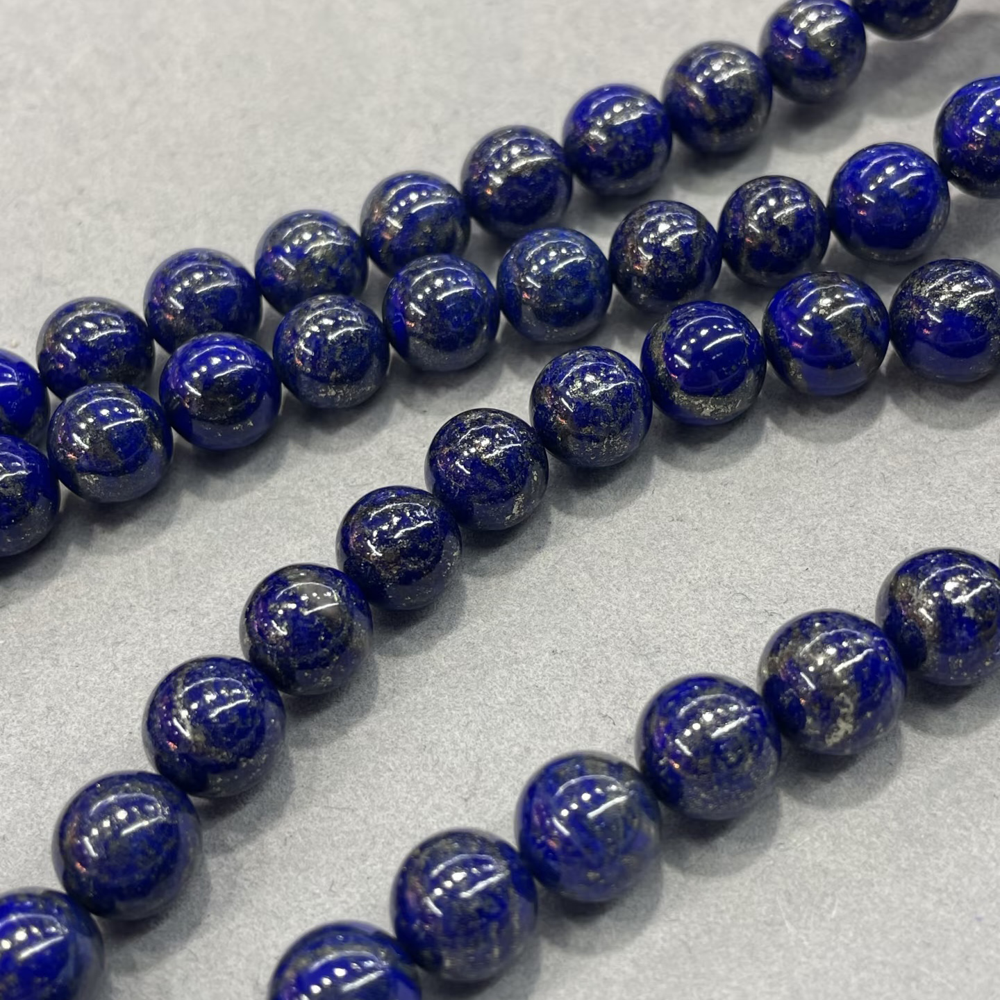 Lapis lazuli beads with large dense pyrite patches