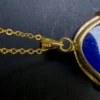 S925 hallmark on gold-toned lapis lazuli pendant bail