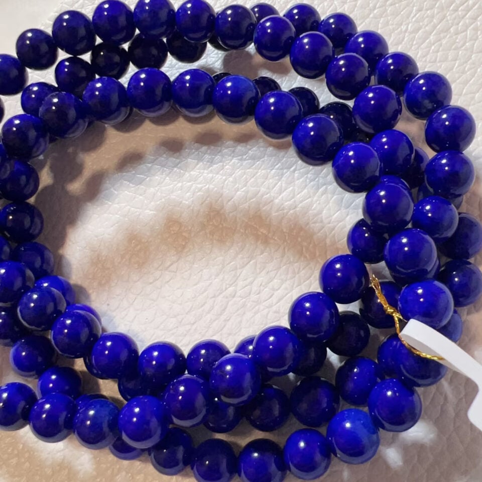 Top-quality lapis lazuli beads with clean saturated blue and no obvious visible calcite or pyrite