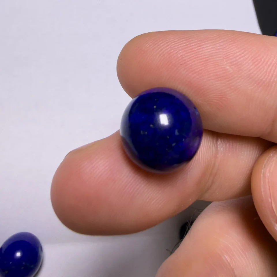 Macro close-up of very dark natural lapis showing blue and near-black areas