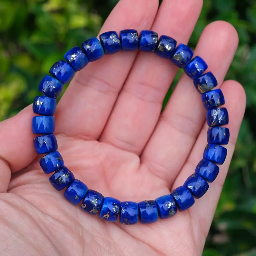 Blue lapis lazuli barrel beads with scattered pyrite accents